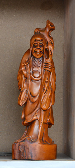 壽星木雕中的花卉意象 藝術(shù)與文化的交融